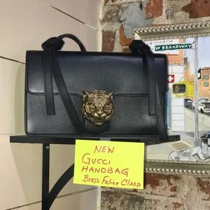 Gucci Handbag with Brass Feline Clasp